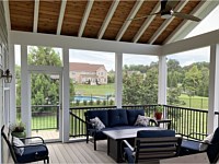 <b>This screened porch interior doesn't skimp on style with its exposed cedar ceiling and ceiling fan</b>